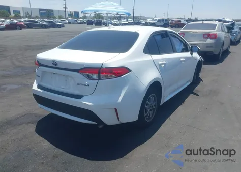 2021 Toyota Corolla Hybrid Le from USA, damaged, VIN JTDEAMDE2MJ031122